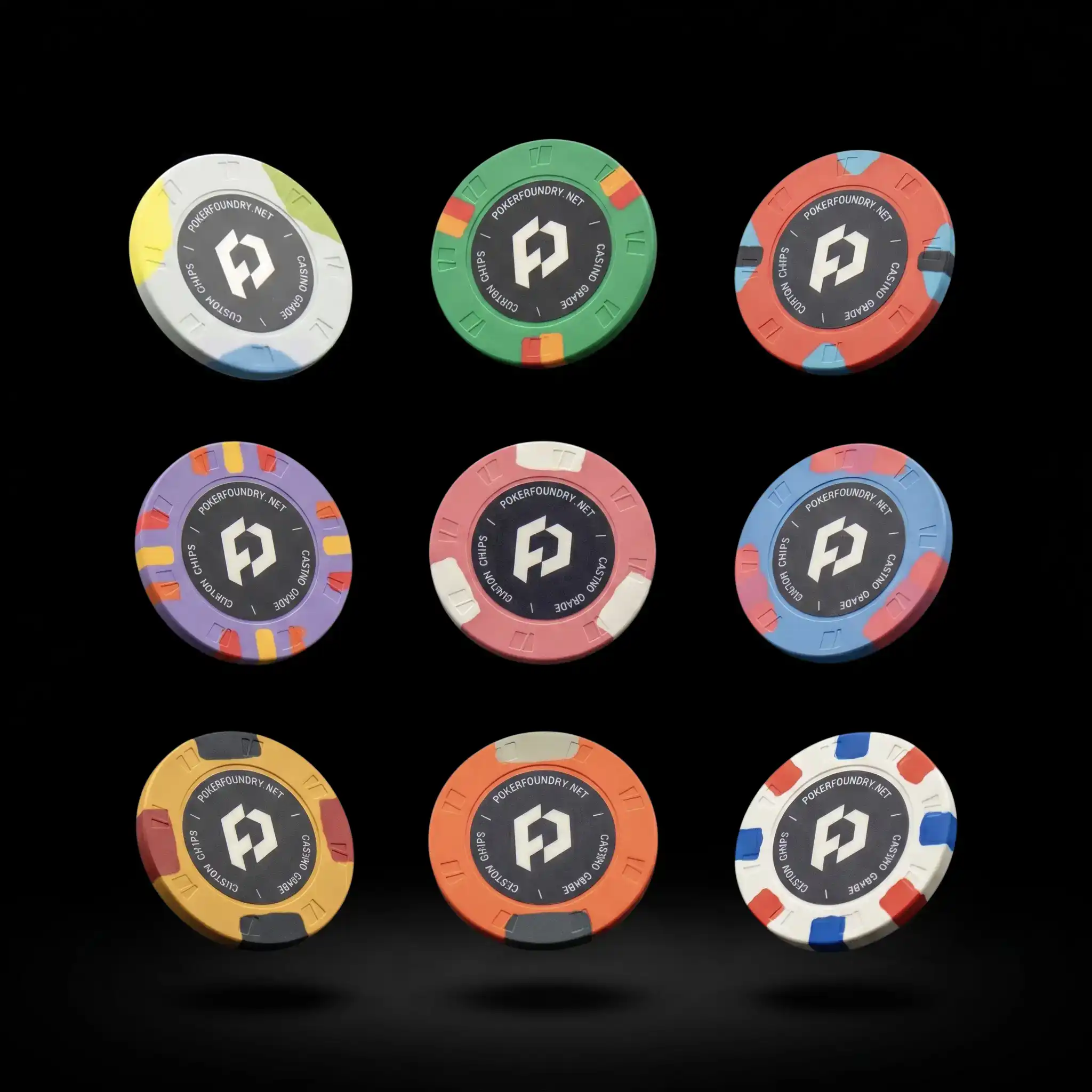Custom ceramic poker chips floating on black background — Poker Foundry